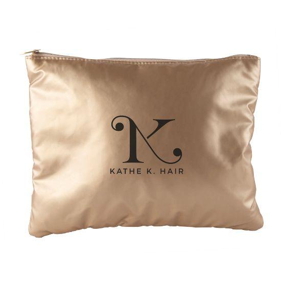 Trousse matelassée brillante